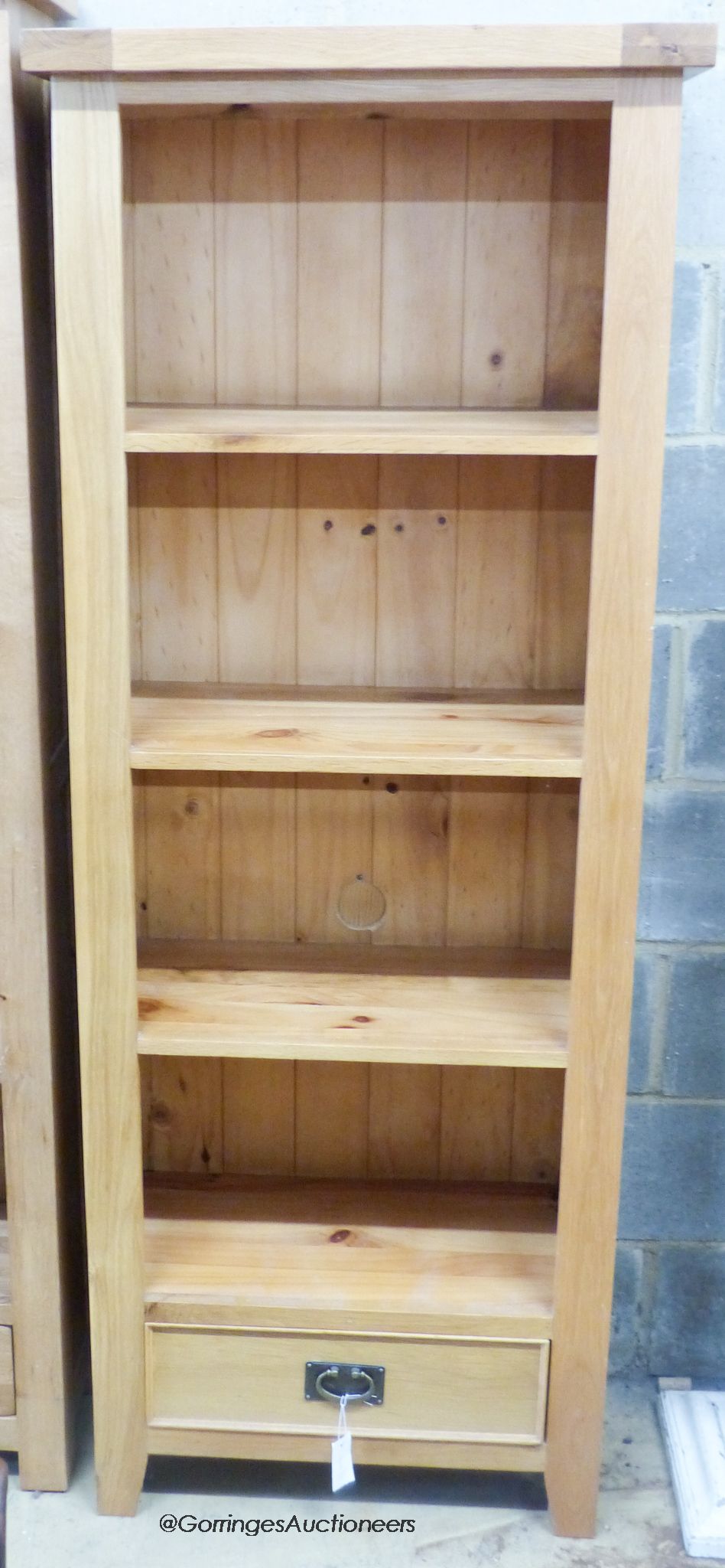 A contemporary light oak open bookcase, length 70cm, depth 34cm, height 182cm